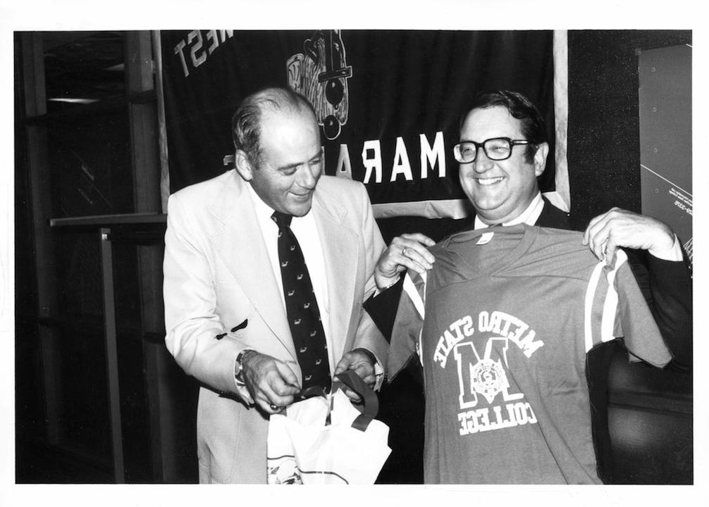 Richard Fontera and Roadrunner Coach showing off Metro State College T-Shirts