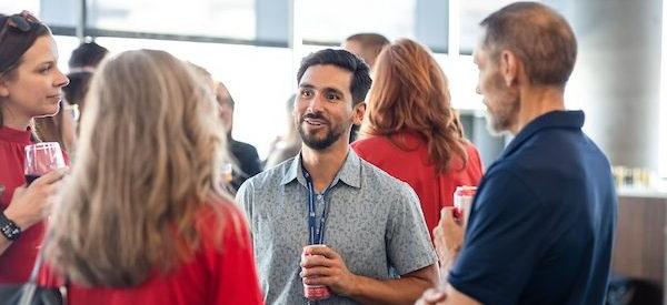 MSU Denver Staff and Faculty mingle at an event.